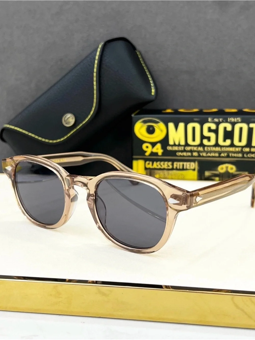 Moscot Sunglasses - Translucent Blush Frame with Gray Lenses